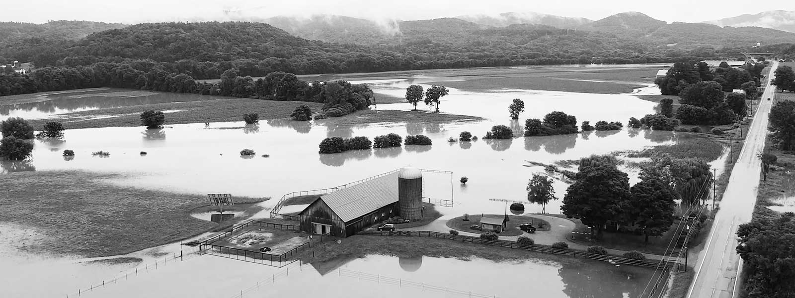 Aerial photo of flooded Vermont Farm, July, 2023